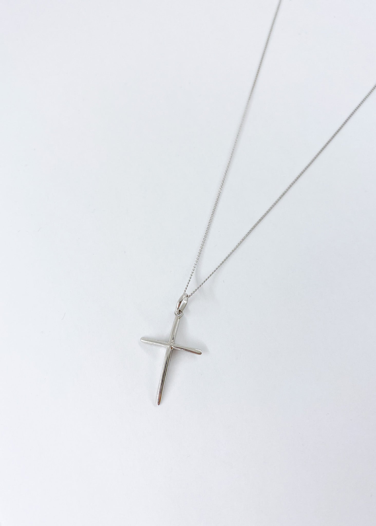 Minimalist cross store necklace